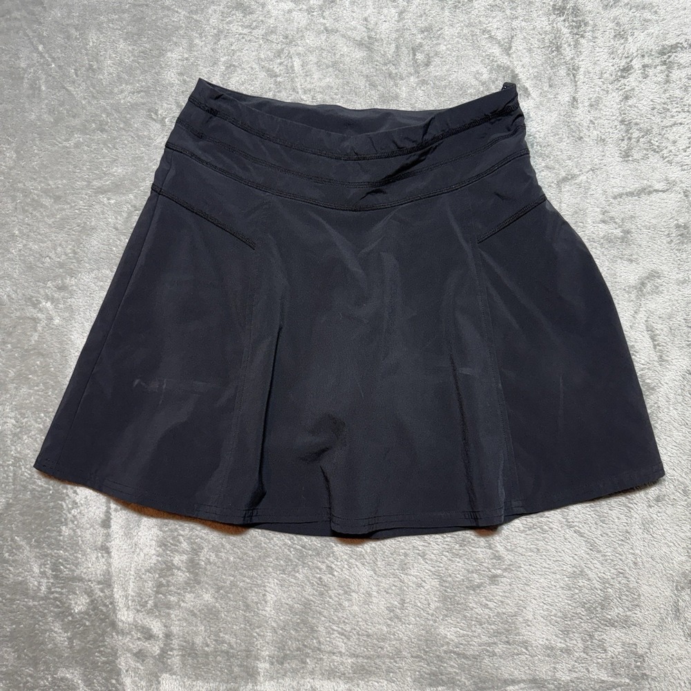 Athleta Black Skirt Size 4 Athletic Skort Pleated Side Zip Pocket Athleisure - Picture 1 of 6